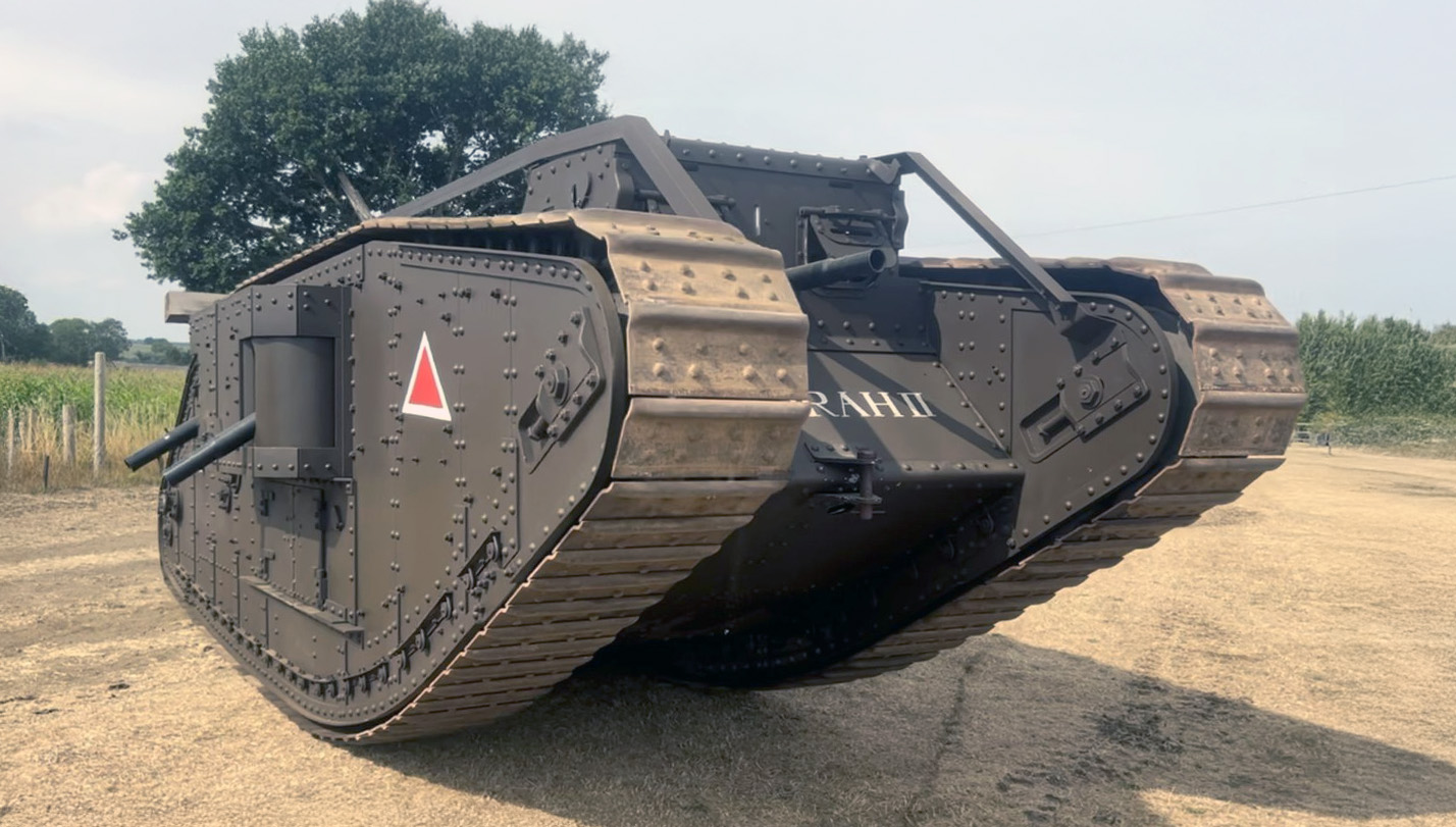 Norfolk Tank Museum Replica Mark IV Deboarah II Colour photograph showing a replica First World War Mark IV tank in a rural setting.