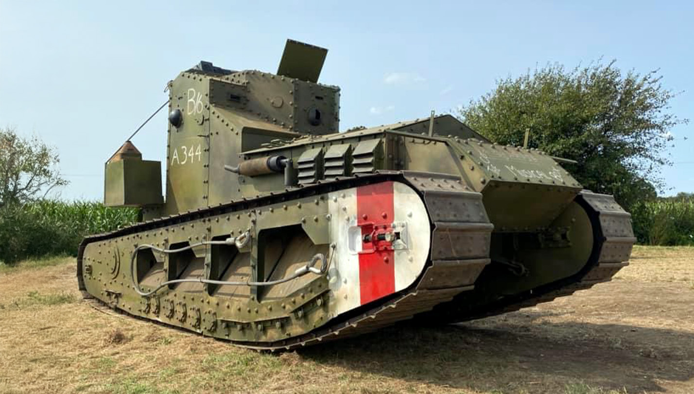 Whippet Replica 'Musical Box Colour photograph showing a lifesize running replica of a First World War 'Whippet' tank in a rural setting.