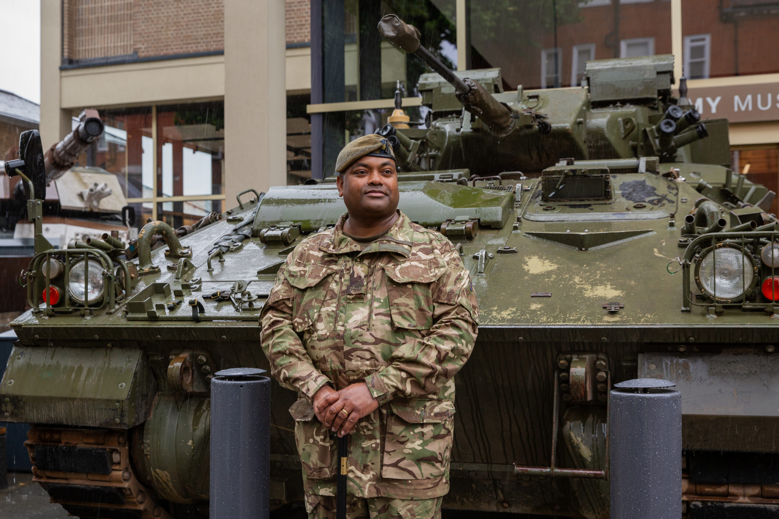 WO1 Johnson Beharry VC with Warrior IFV © National Army Museum Johnson Beharry standing in front of a Warrior