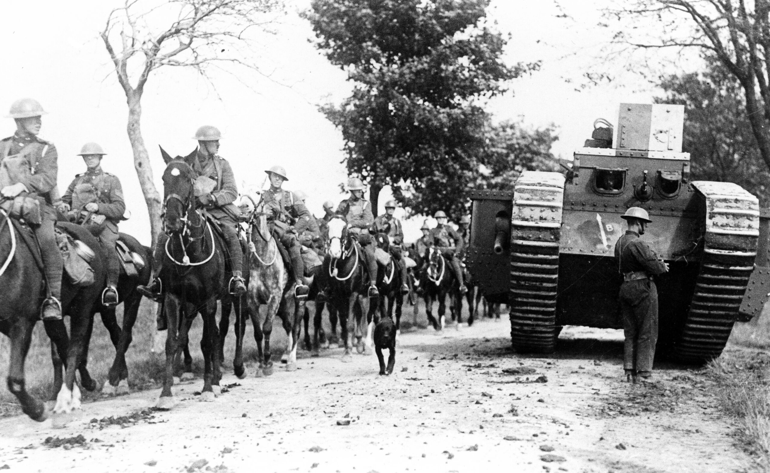 Cav passing Mk V British Cavalry pass a Mk. V Heavy Tank during the Battle of Amiens.